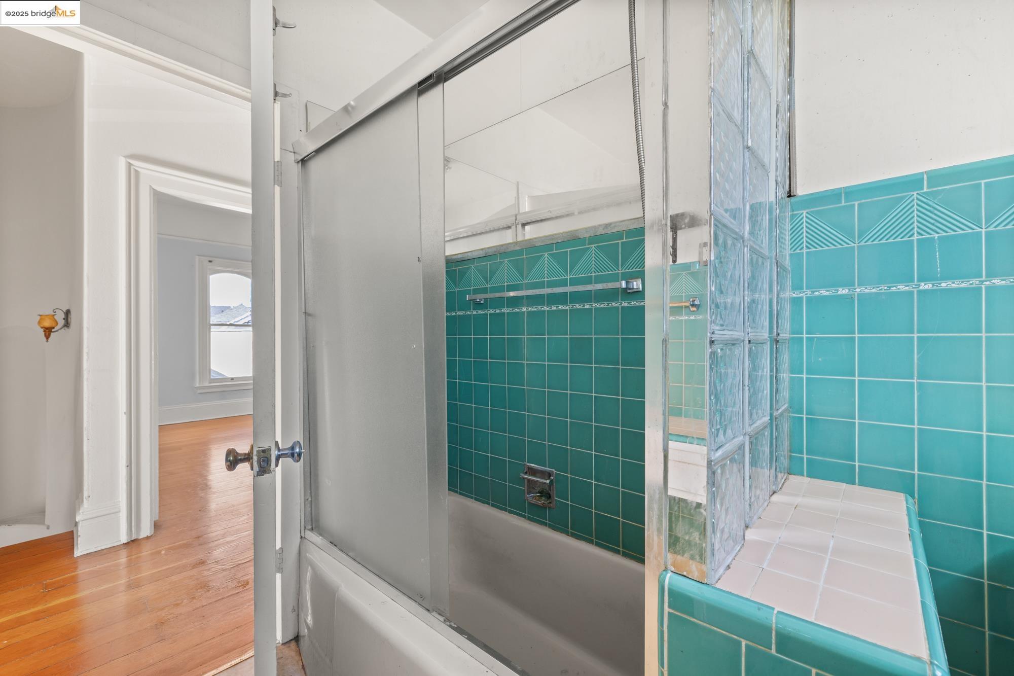 1746 8th Street Oakland, CA 94607 - Photo 23 of 52 a bathroom with a shower