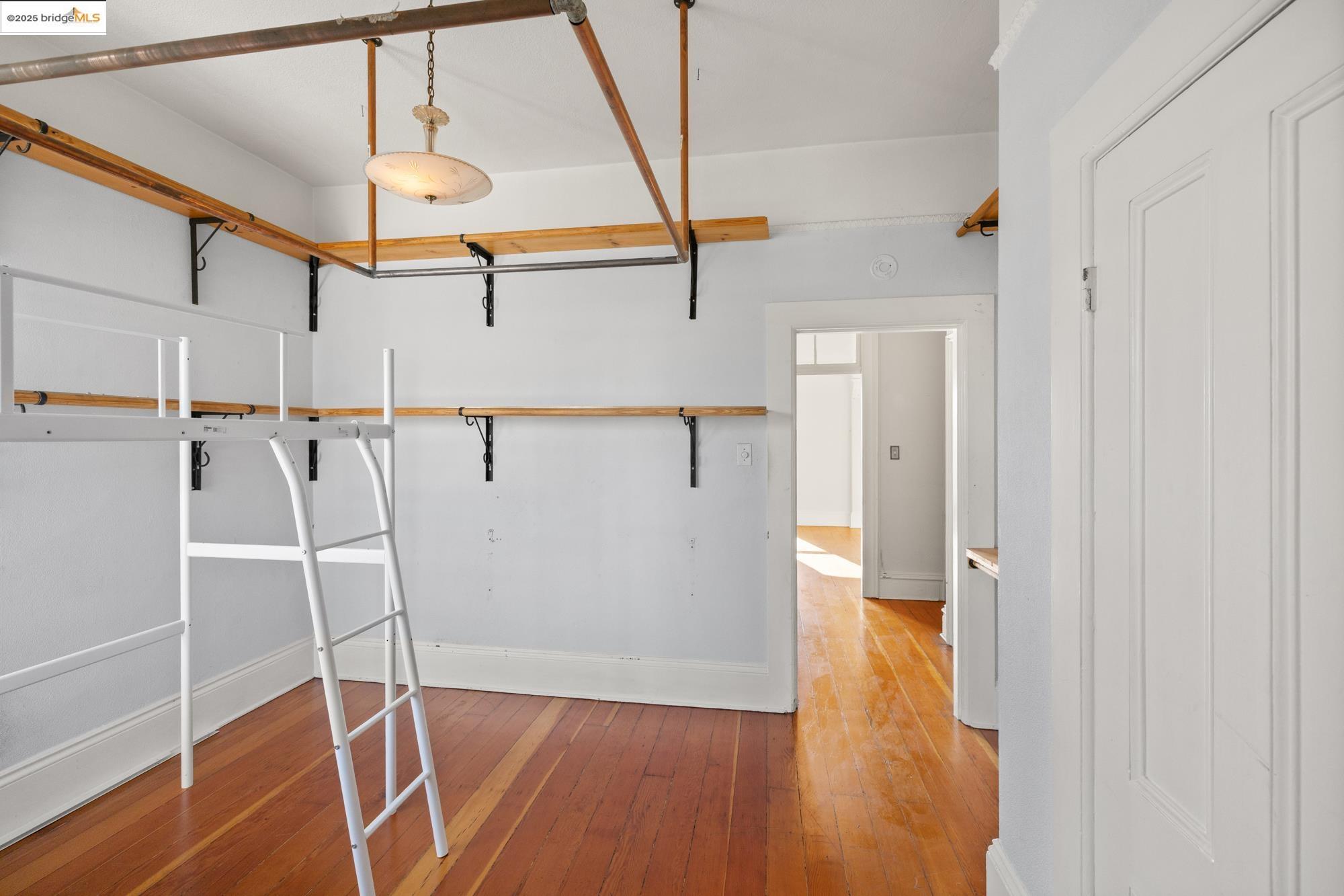1746 8th Street Oakland, CA 94607 - Photo 29 of 52 a view of hallway with wooden floor
