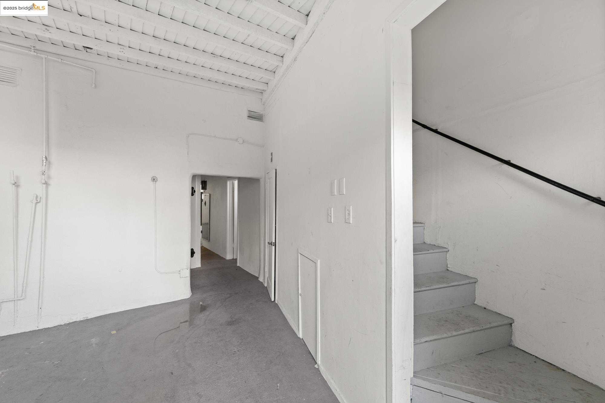 1746 8th Street Oakland, CA 94607 - Photo 39 of 52 a view of a hallway with staircase