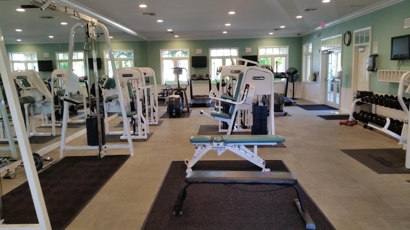37 Harbour Isle Drive East, Unit 101 Fort Pierce, FL 34949 - Photo 7 of 12 a view of a room with gym equipment