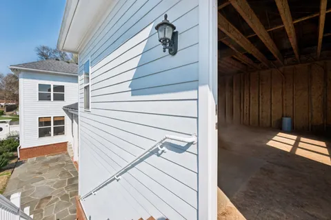 a view of an empty room with windows
