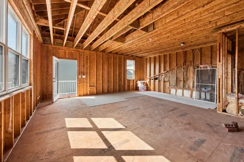 a view of a backyard with plants