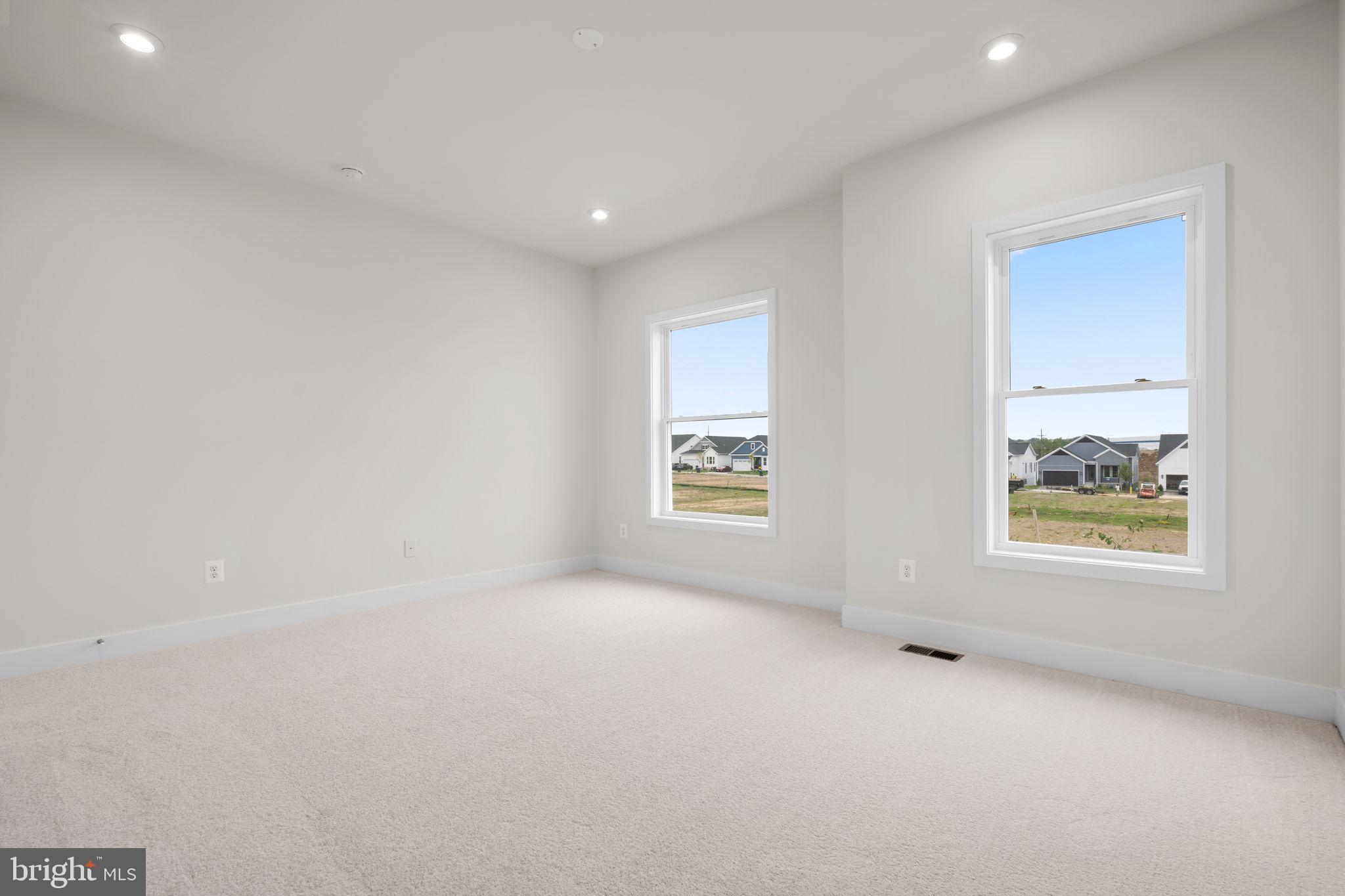116 Keystone Lane, Unit HOMESITE 1097 Winchester, VA 22603 - Photo 28 of 42 an empty room with windows