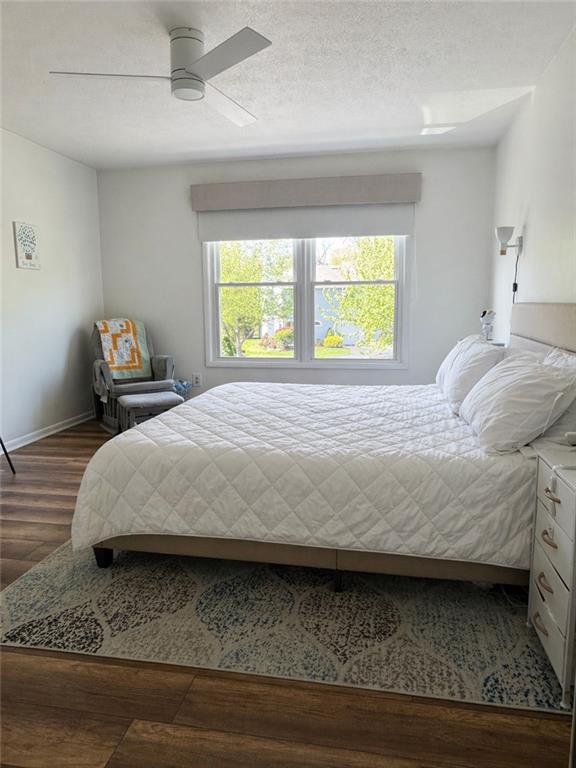 404 Chandler Place Pittsburgh, PA 15212 - Photo 15 of 26 The spacious 16' x 12' primary bedroom features a walk-in closet and direct access to the full bath, creating a comfortable and functional private retreat.