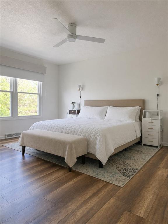 404 Chandler Place Pittsburgh, PA 15212 - Photo 17 of 26 The spacious 16' x 12' primary bedroom features a walk-in closet and direct access to the full bath, creating a comfortable and functional private retreat.