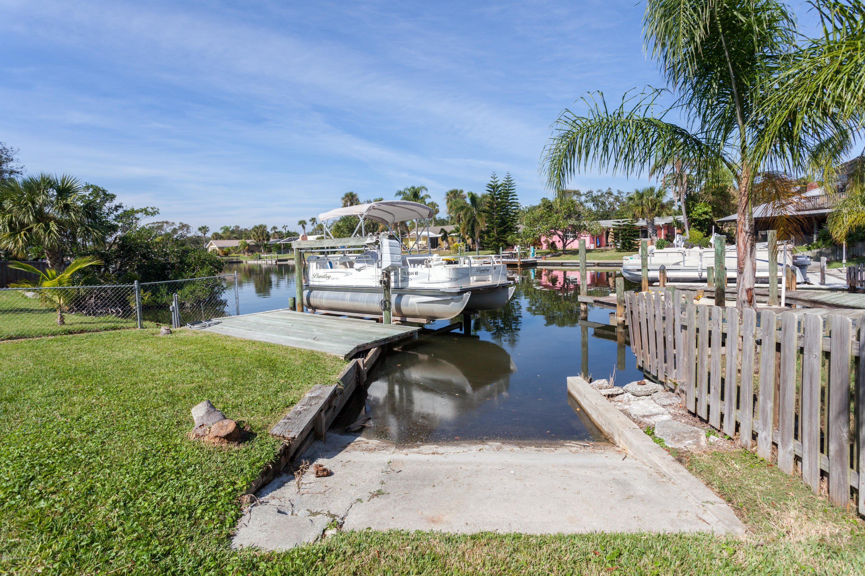 1035 Trinidad Road Cocoa Beach, FL 32931 - Photo 4 of 23 a view of a backyard and a patio