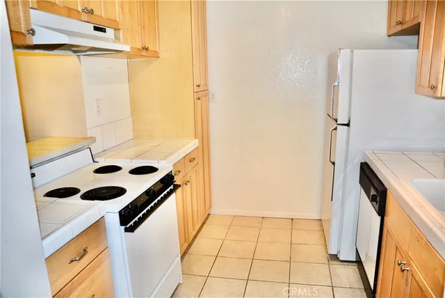 a bathroom with a sink and a washing machine