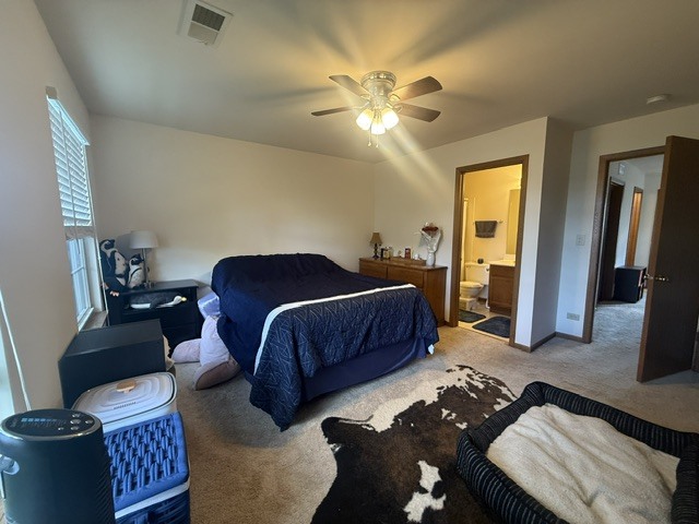 348 Fallbrook Court Schaumburg, IL 60107 - Photo 15 of 21 a living room with furniture and a chandelier