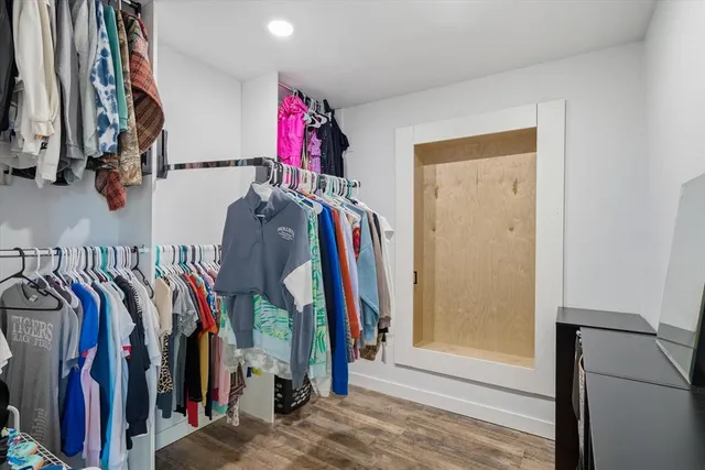 a bathroom with a double vanity sink and mirror