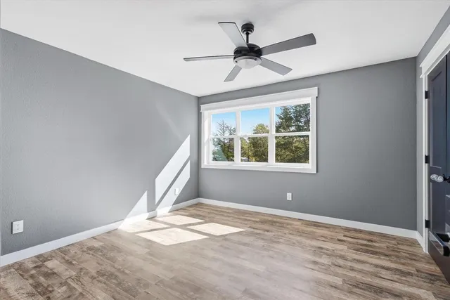 a bathroom with a sink a vanity and a mirror