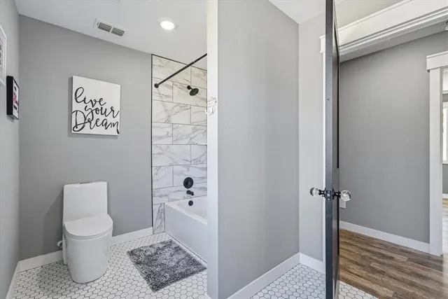 a view of a workspace with furniture