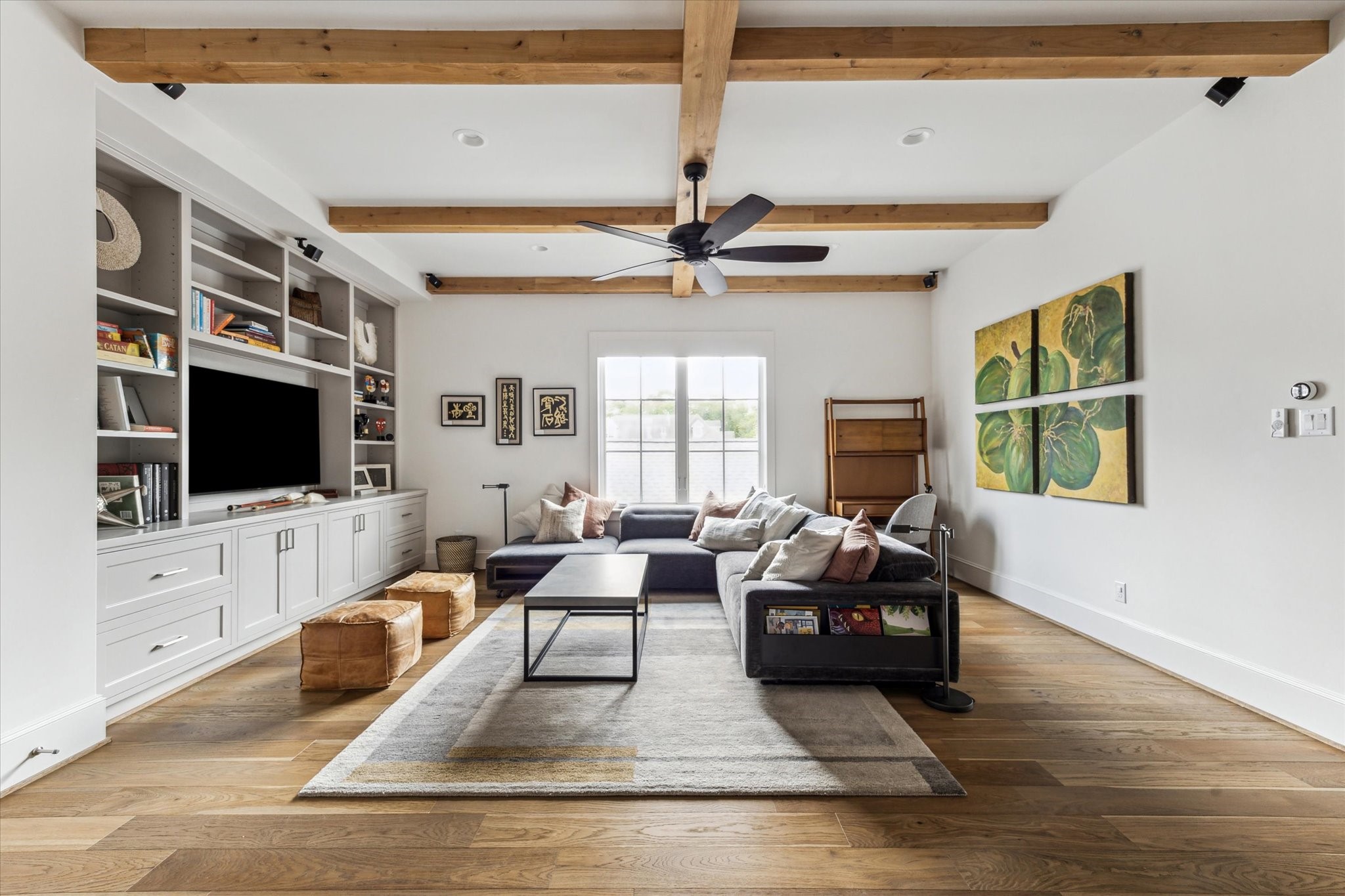 2224 North Boulevard Houston, TX 77098 - Photo 34 of 50 a living room with furniture and a flat screen tv