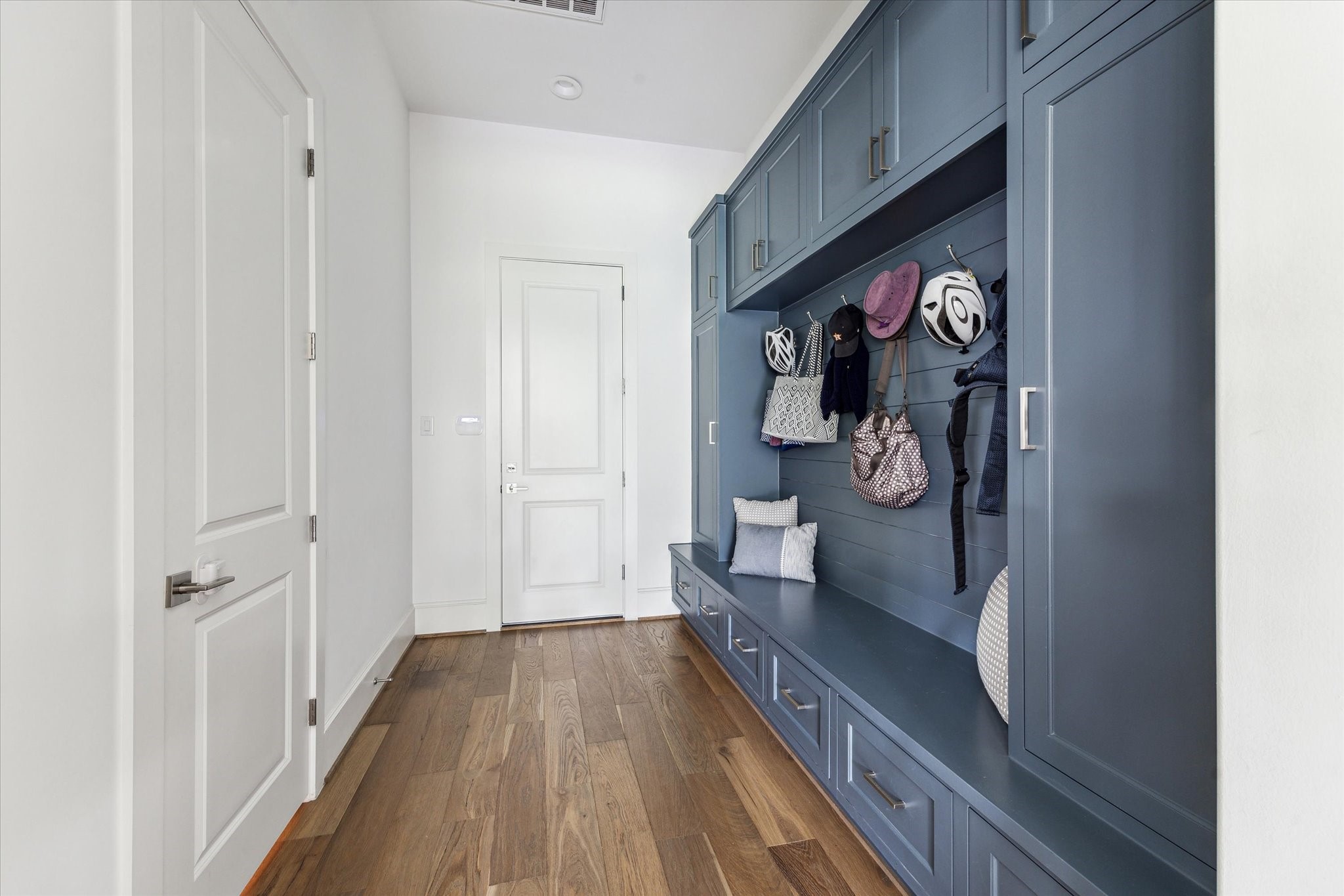 2224 North Boulevard Houston, TX 77098 - Photo 43 of 50 a view of a hallway with wooden floor and a living room