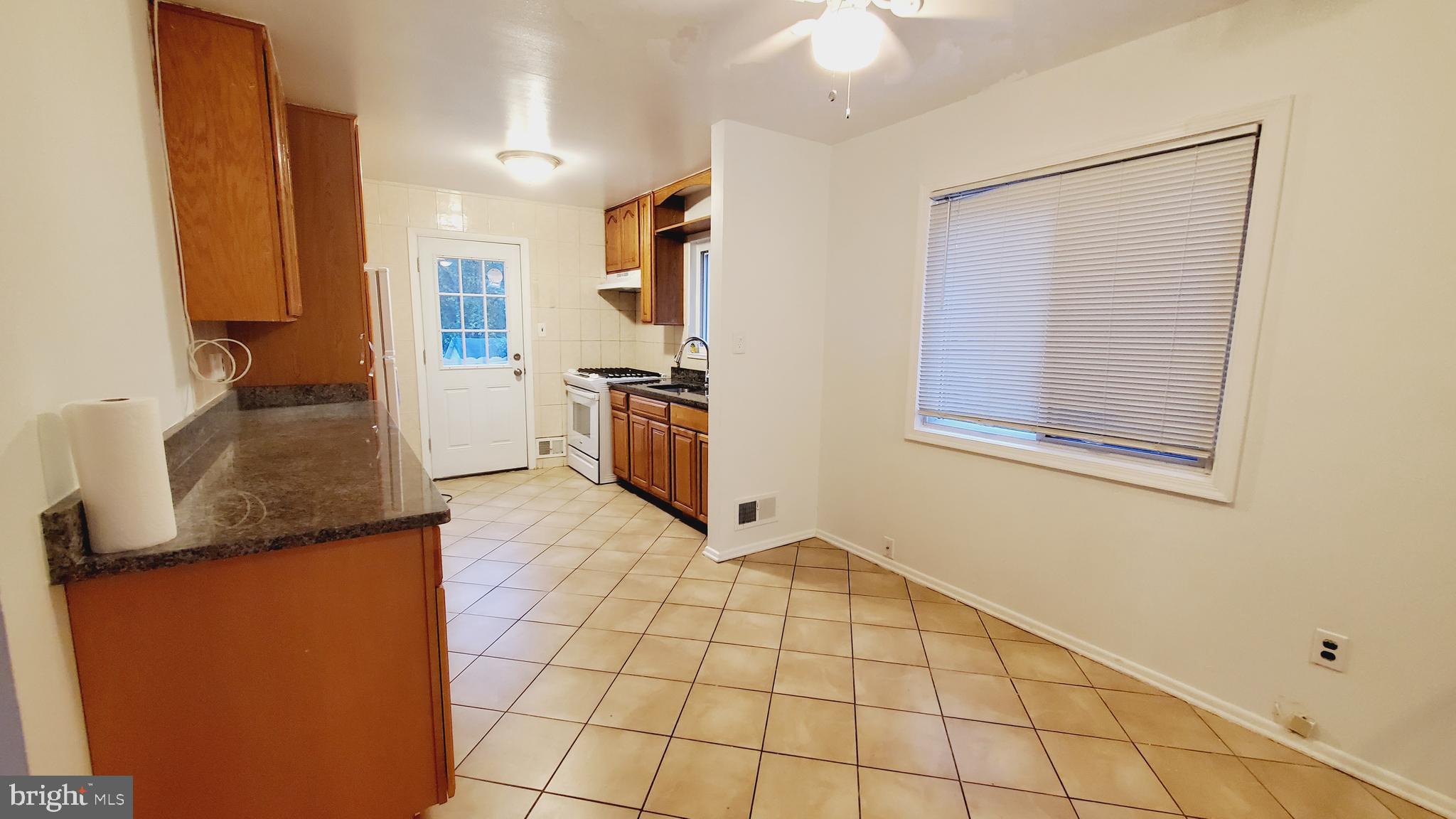 3804 Ralph Road Silver Spring, MD 20906 - Photo 11 of 57 Renovated Kitchen with Dining & New Appliances