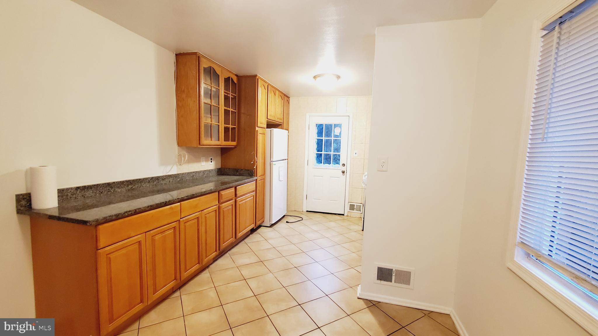 3804 Ralph Road Silver Spring, MD 20906 - Photo 12 of 57 Renovated Kitchen with Dining & New Appliances