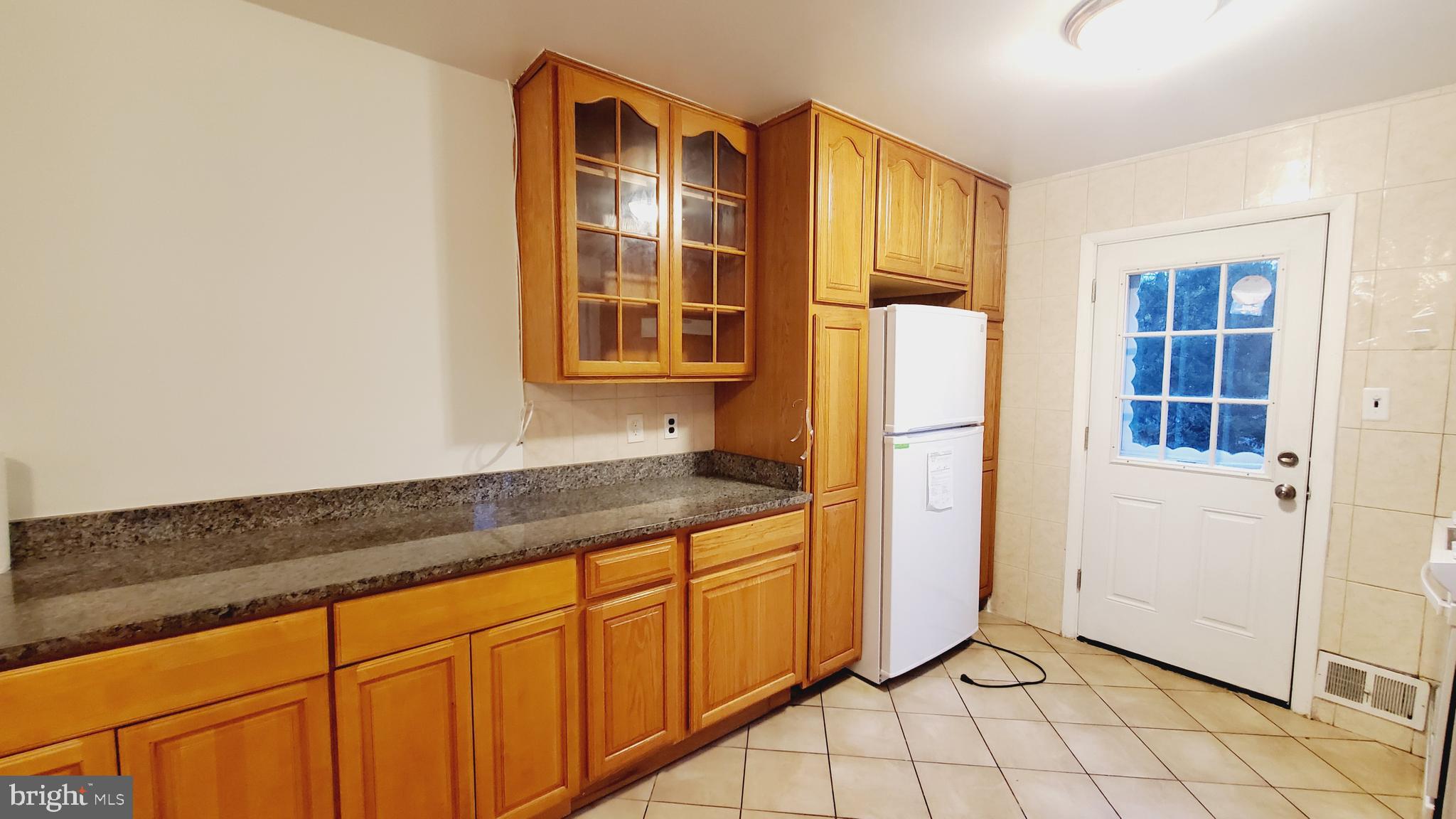 3804 Ralph Road Silver Spring, MD 20906 - Photo 14 of 57 Renovated Kitchen with Dining & New Appliances