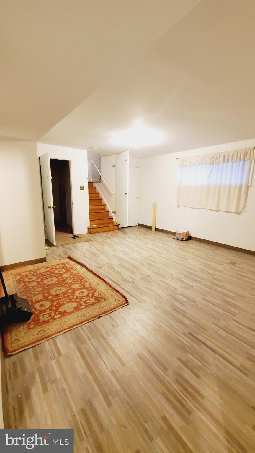 3804 Ralph Road Silver Spring, MD 20906 - Photo 40 of 57 Large Family Room with New Floor in the Basement