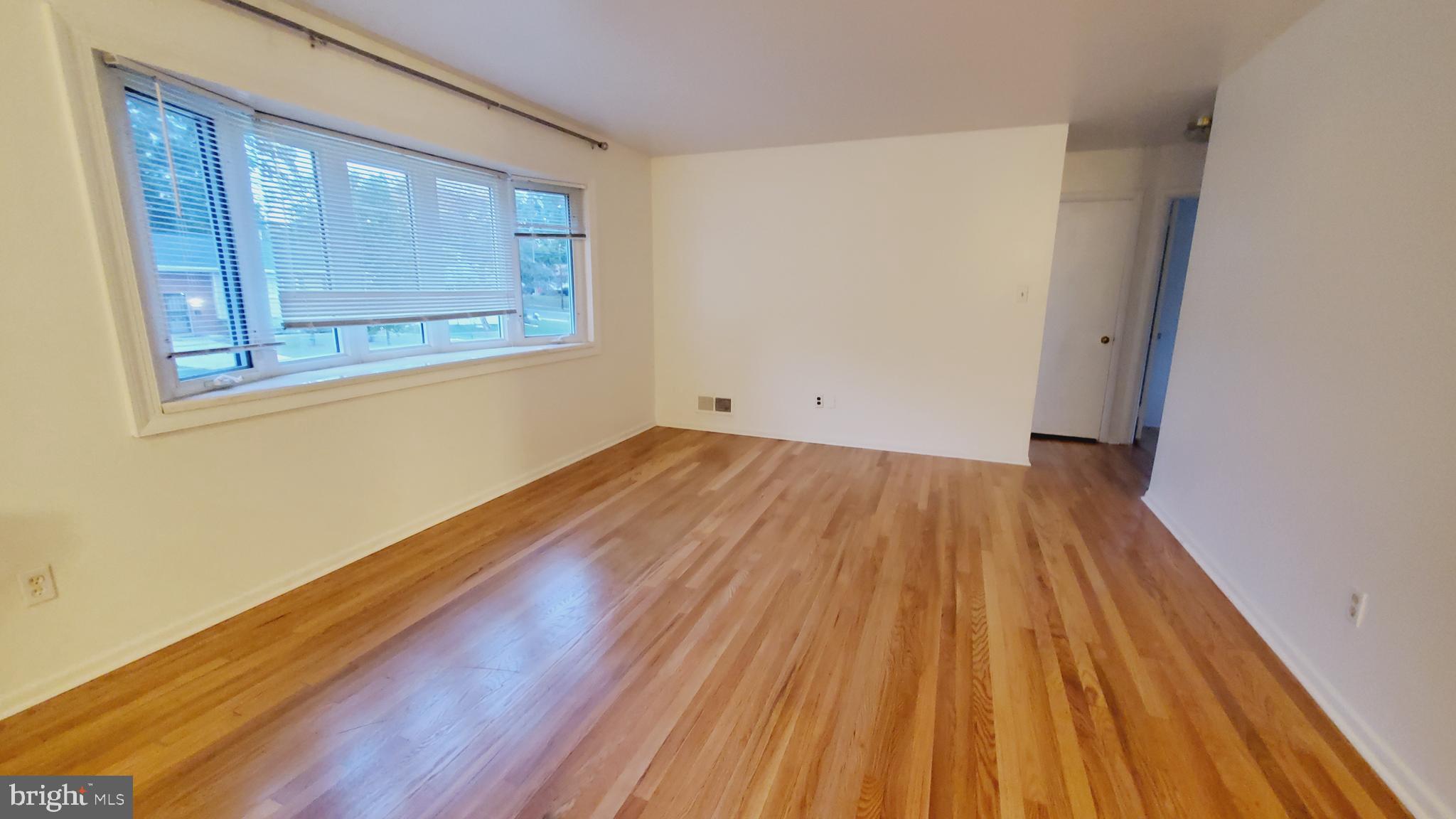3804 Ralph Road Silver Spring, MD 20906 - Photo 7 of 57 Wide Open Living Room with Big Bay Window