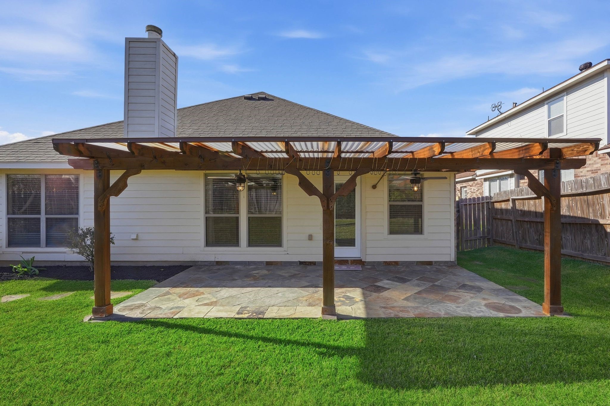 18720 Rosalea Way Montgomery, TX 77356 - Photo 30 of 41 a front view of a house with a yard and porch