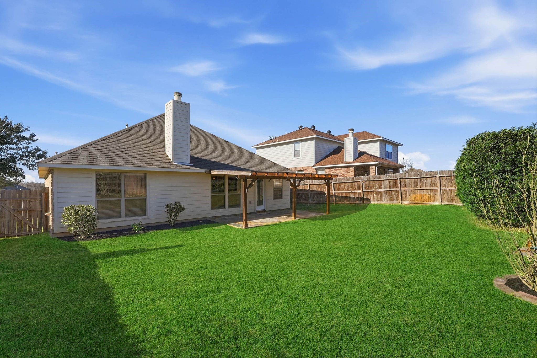 18720 Rosalea Way Montgomery, TX 77356 - Photo 31 of 41 a view of a house with a yard and sitting area