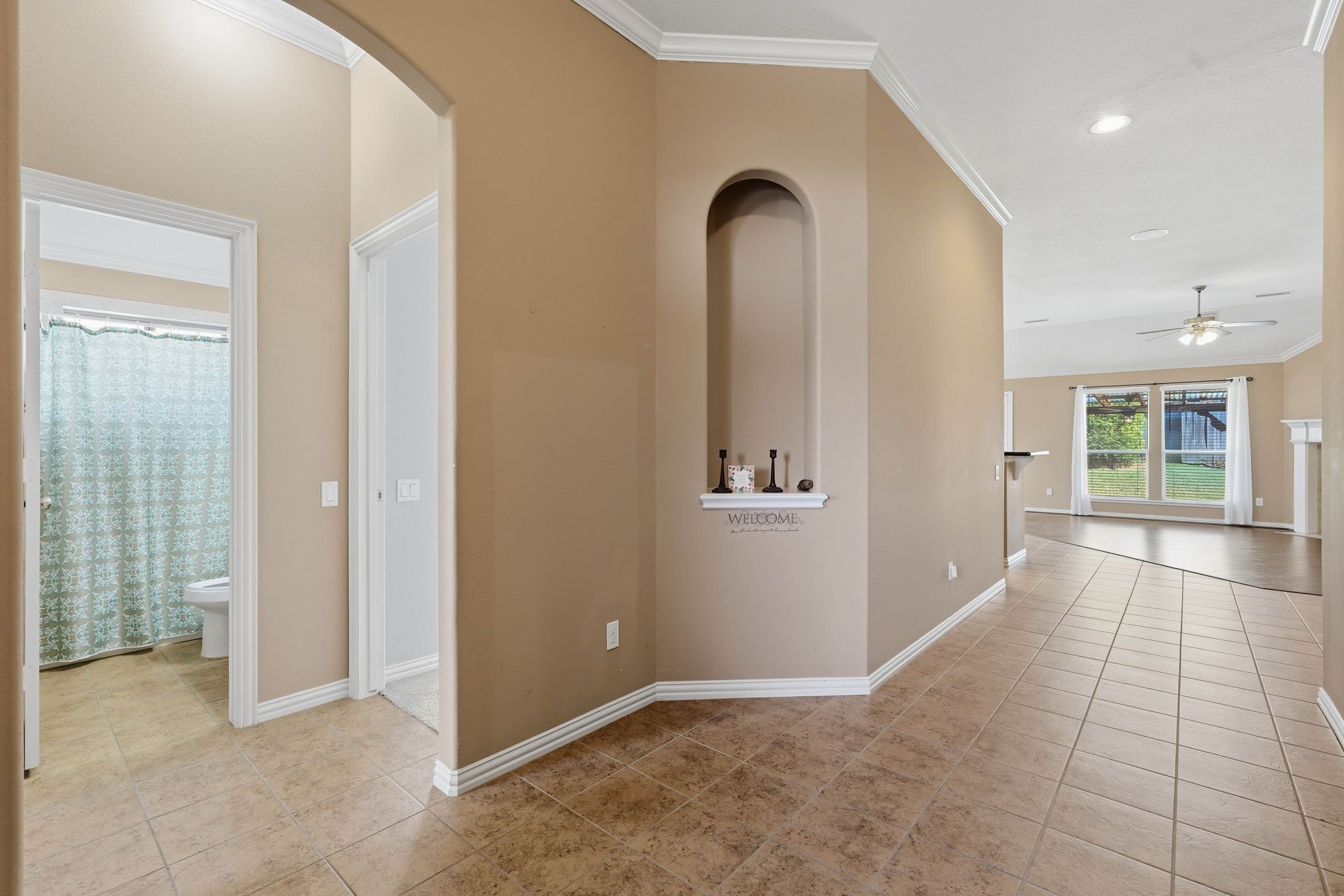 18720 Rosalea Way Montgomery, TX 77356 - Photo 6 of 41 an empty room with entrance and windows