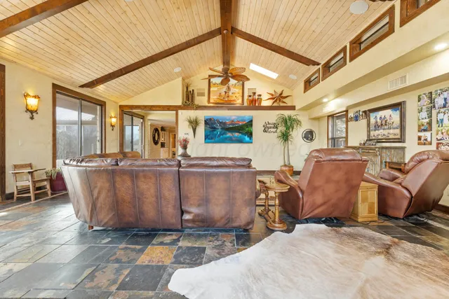 a bath tub sitting next to a bathroom sink