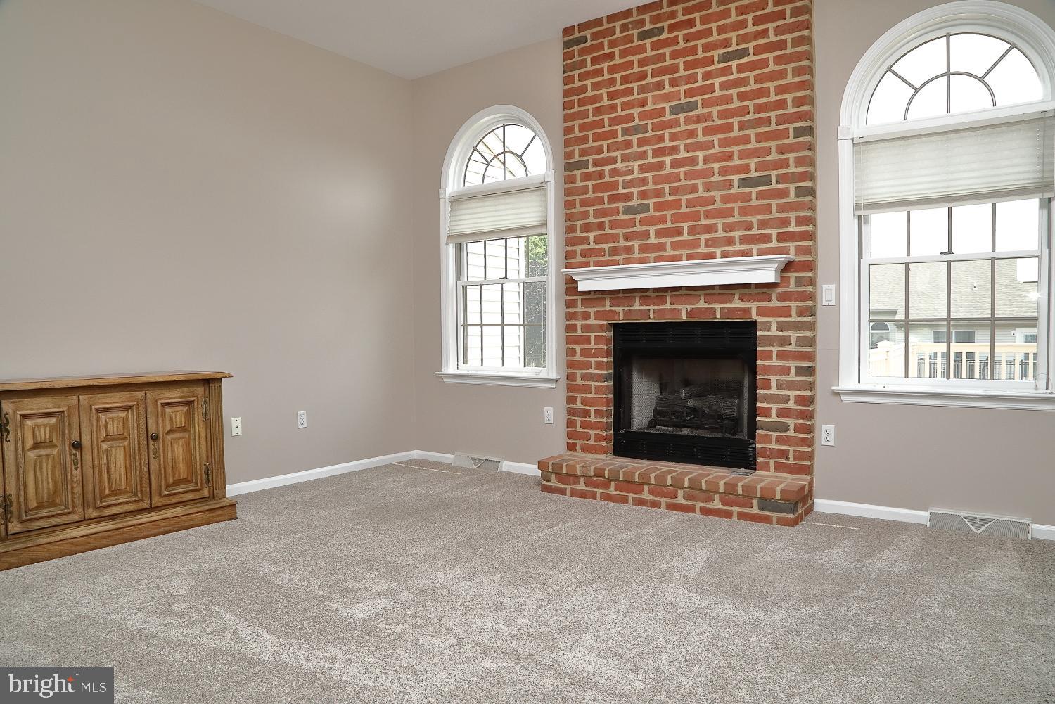 13 Village Drive Lititz, PA 17543 - Photo 4 of 35 Living Room w Gas Fireplace