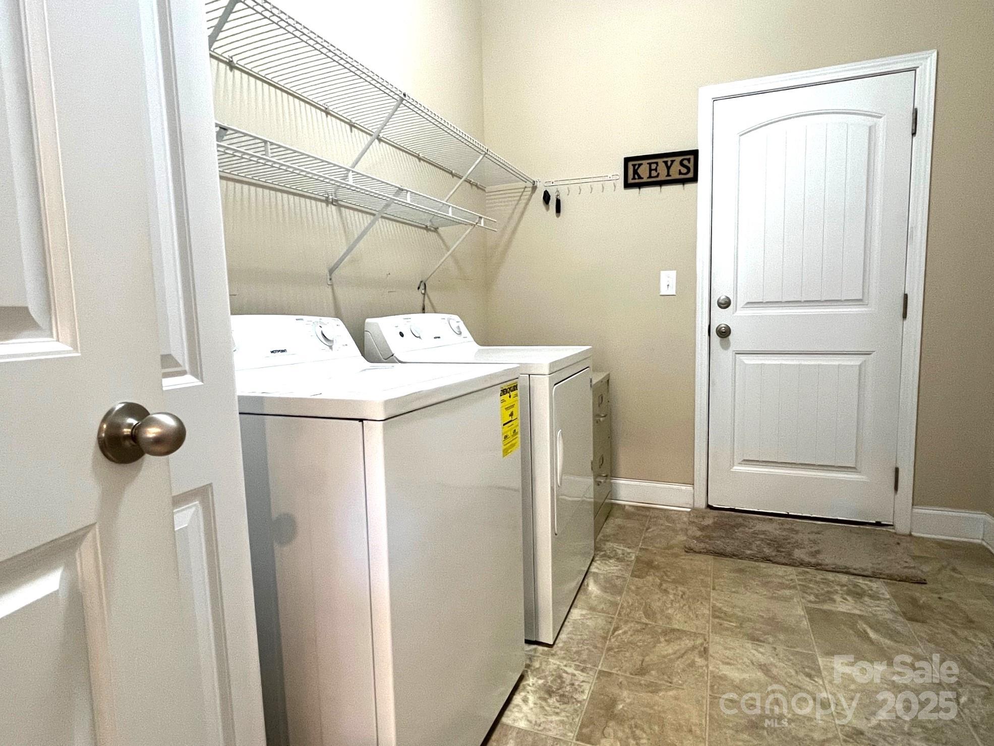 3006 Cricket Lane Lancaster, SC 29720 - Photo 21 of 28 a utility room with dryer and washer