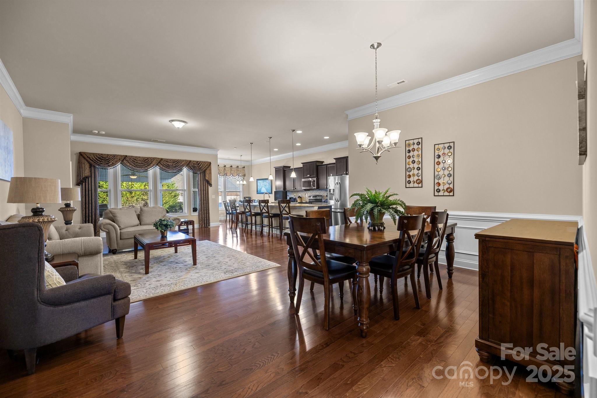 3006 Cricket Lane Lancaster, SC 29720 - Photo 9 of 28 a view of a dining room with furniture and wooden floor