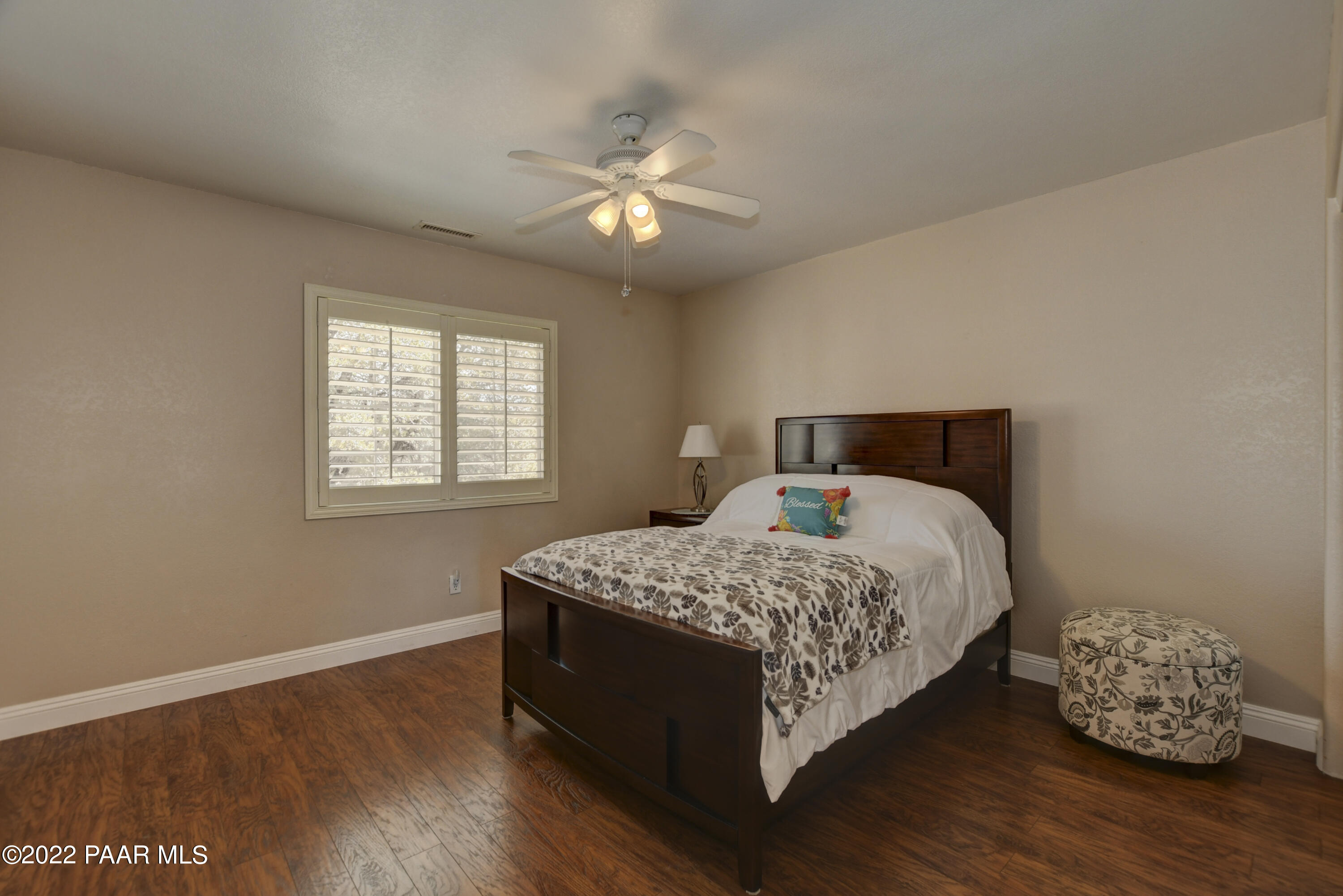 484 Miracle Rider Road Prescott, AZ 86301 - Photo 21 of 32 a bedroom with a bed and window