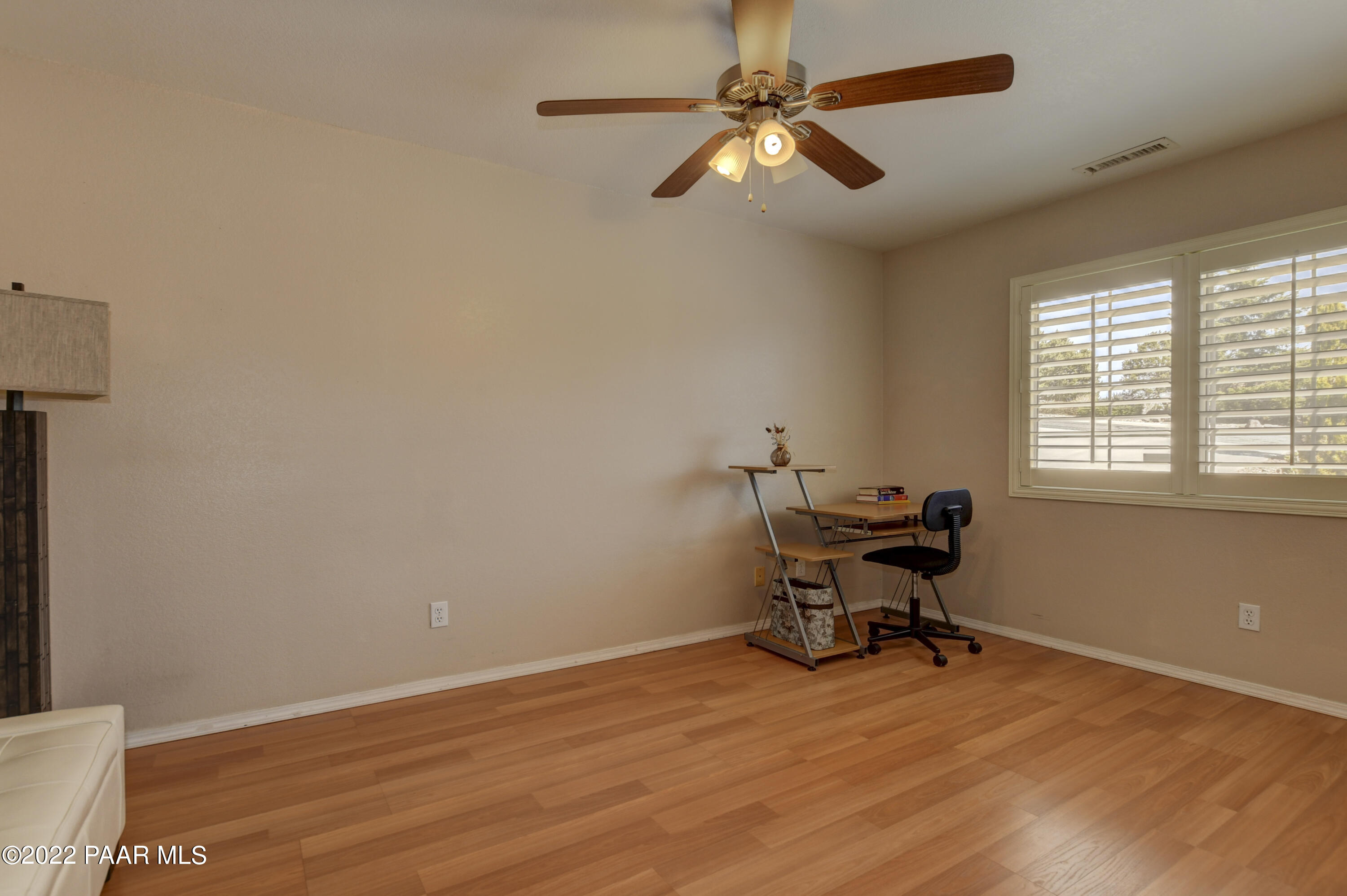 484 Miracle Rider Road Prescott, AZ 86301 - Photo 23 of 32 a view of a workspace with furniture and a window