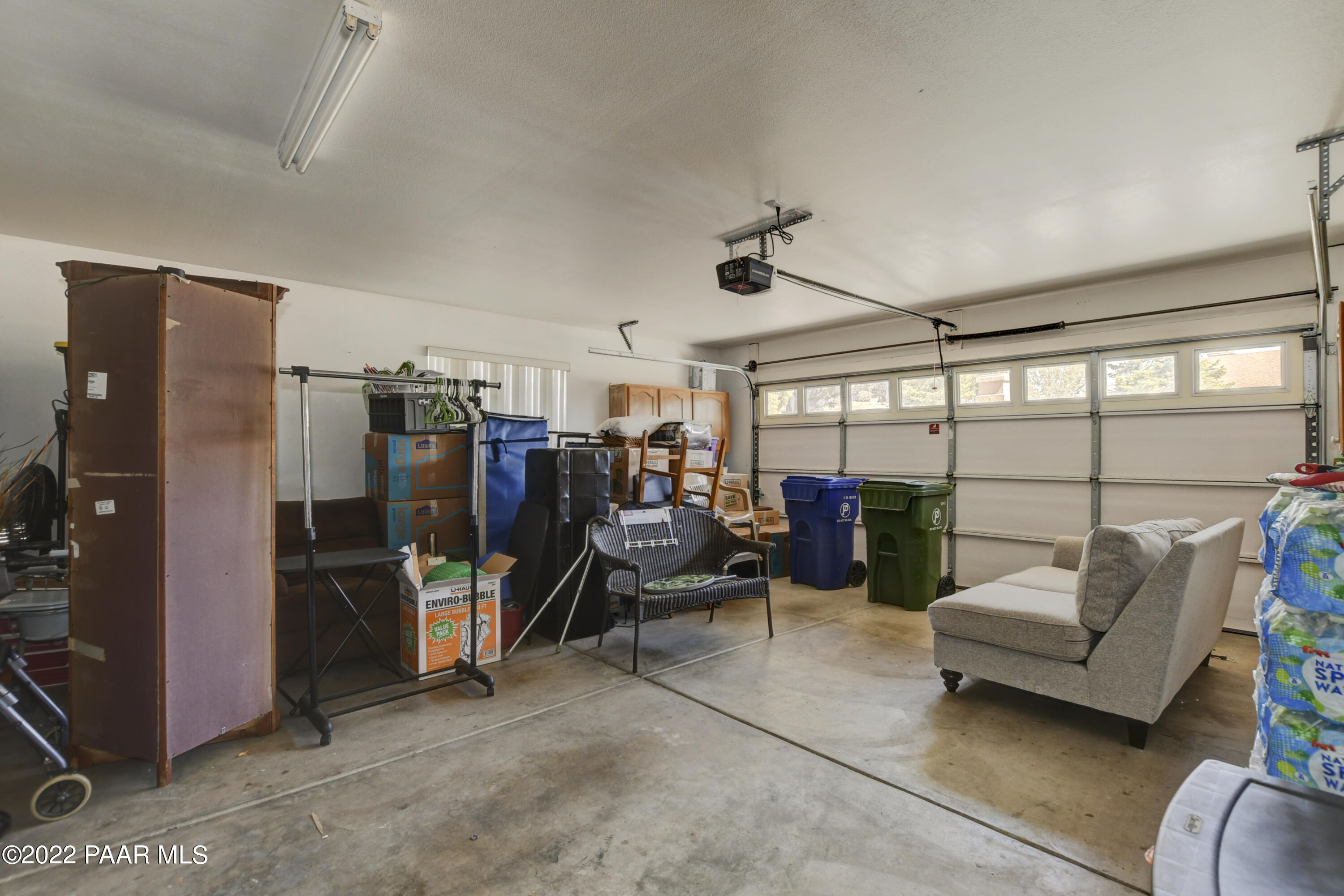 484 Miracle Rider Road Prescott, AZ 86301 - Photo 25 of 32 a living room with furniture and a large window