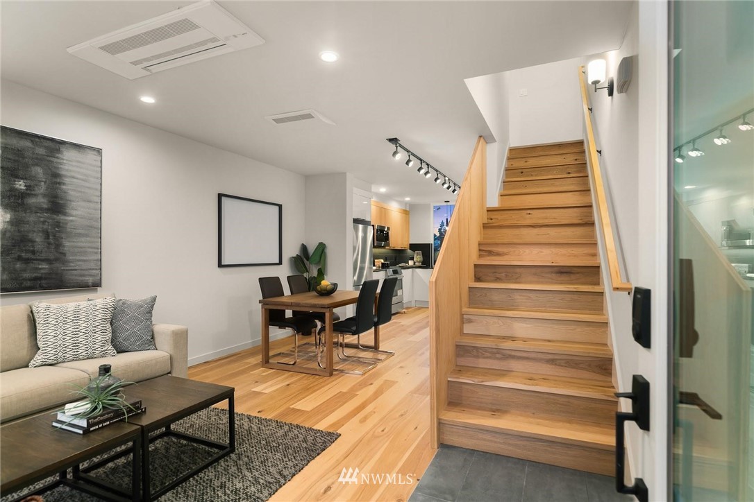 5202 Renton Avenue South Seattle, WA 98118 - Photo 2 of 10 a living room with furniture and wooden floor