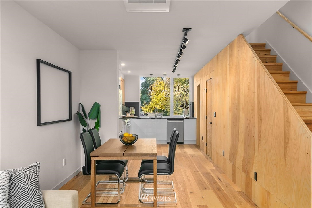 5202 Renton Avenue South Seattle, WA 98118 - Photo 5 of 10 a view of a dining room with furniture and a window