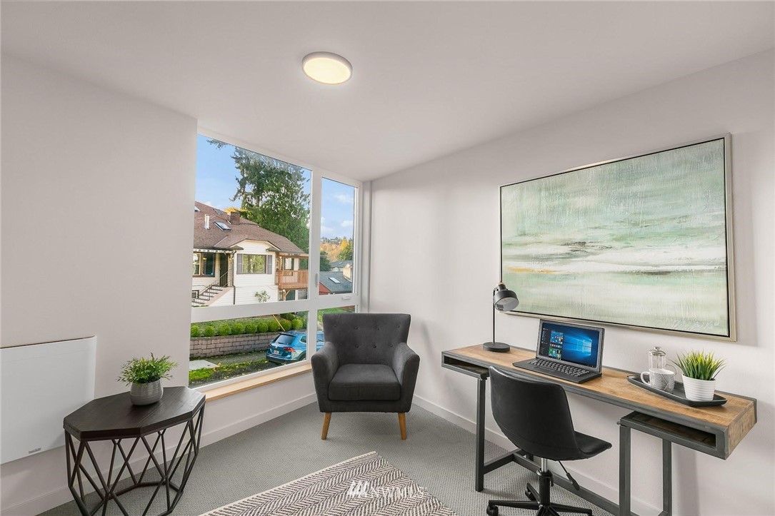 5202 Renton Avenue South Seattle, WA 98118 - Photo 10 of 10 a living room with furniture and a potted plant