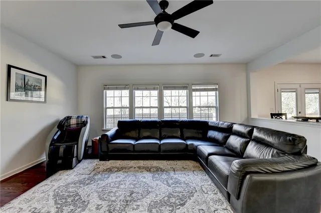 a bedroom with a bed furniture and a window