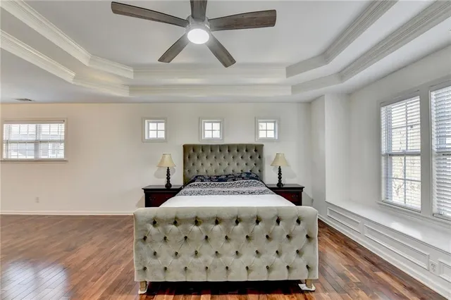 a view of a backyard with sitting area