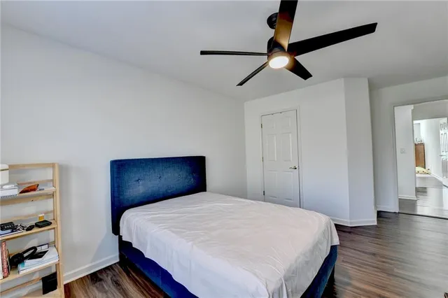 an aerial view of a house with a swimming pool