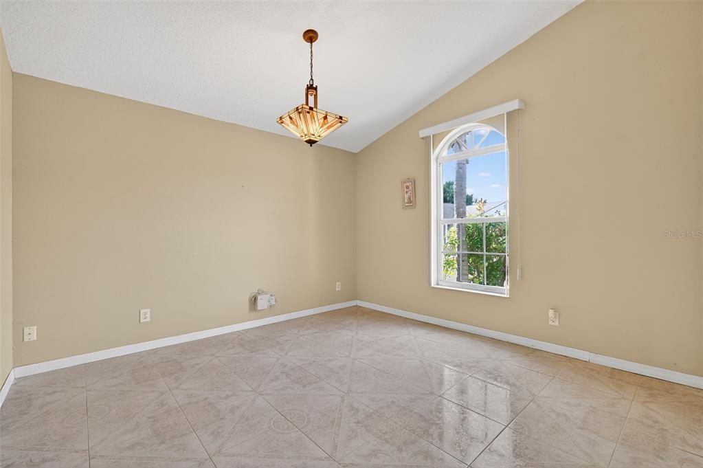 148 Lookout Drive Apollo Beach, FL 33572 - Photo 18 of 71 an empty room with windows and fan