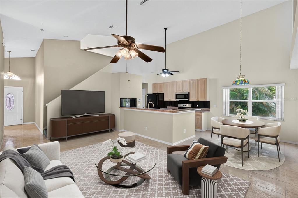 148 Lookout Drive Apollo Beach, FL 33572 - Photo 21 of 71 a living room with furniture kitchen view and a window
