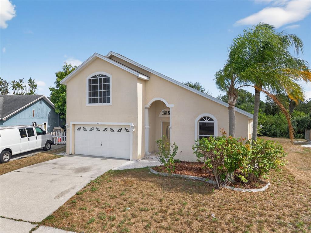 148 Lookout Drive Apollo Beach, FL 33572 - Photo 4 of 71 a view of a house with a yard