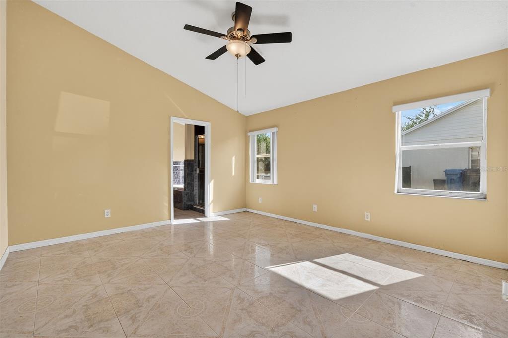 148 Lookout Drive Apollo Beach, FL 33572 - Photo 47 of 71 a view of an empty room with a ceiling fan