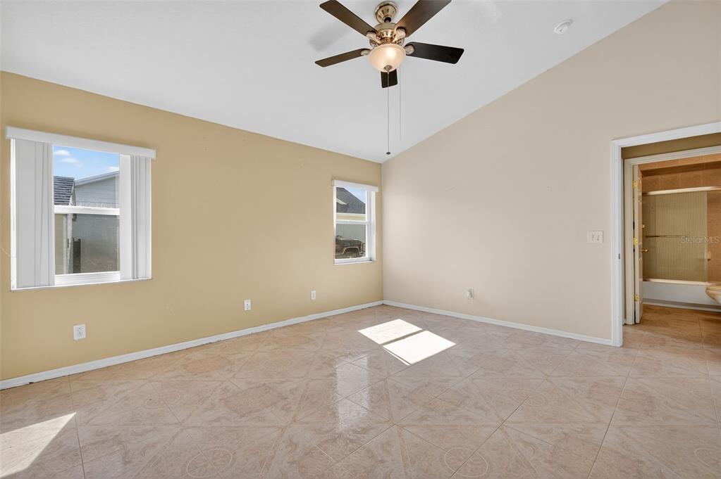 148 Lookout Drive Apollo Beach, FL 33572 - Photo 50 of 71 an empty room with a window and a fan