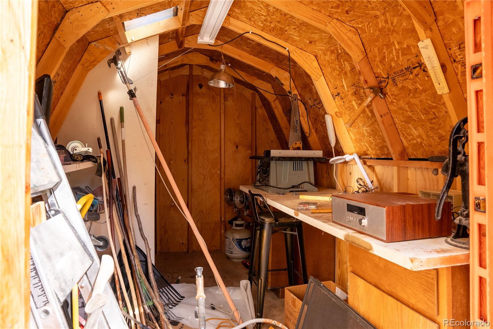 10853 Twin Spruce Road Golden, CO 80403 - Photo 15 of 32 a view of balcony with wooden floor and fence