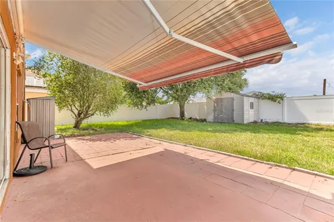 a view of backyard with hardwood