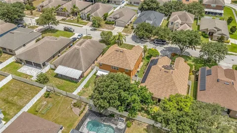 an aerial view of residential house with outdoor space