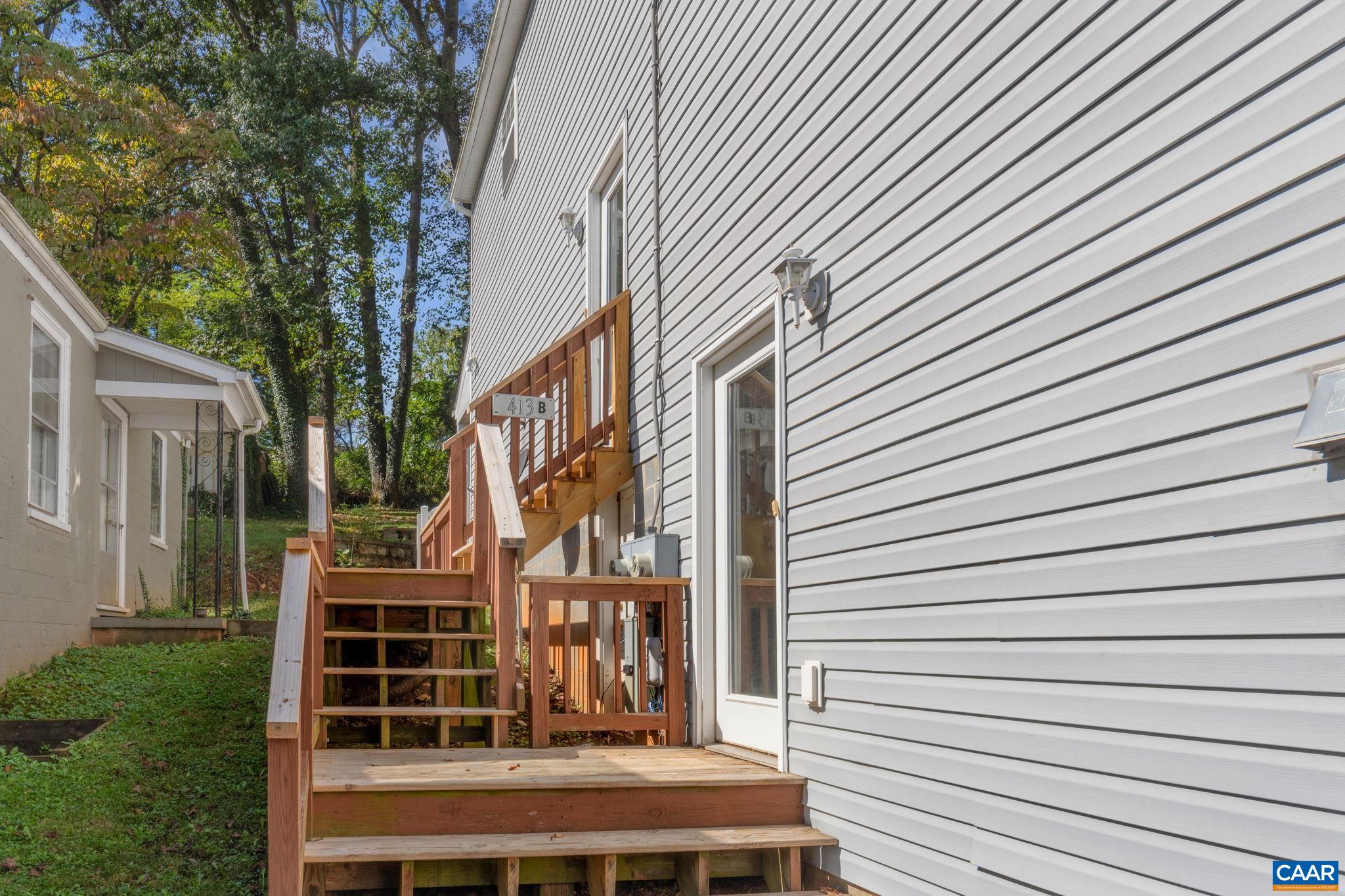 413 Valley Rd Extension Charlottesville, VA 22903 - Photo 16 of 18 a view of front of house and yard