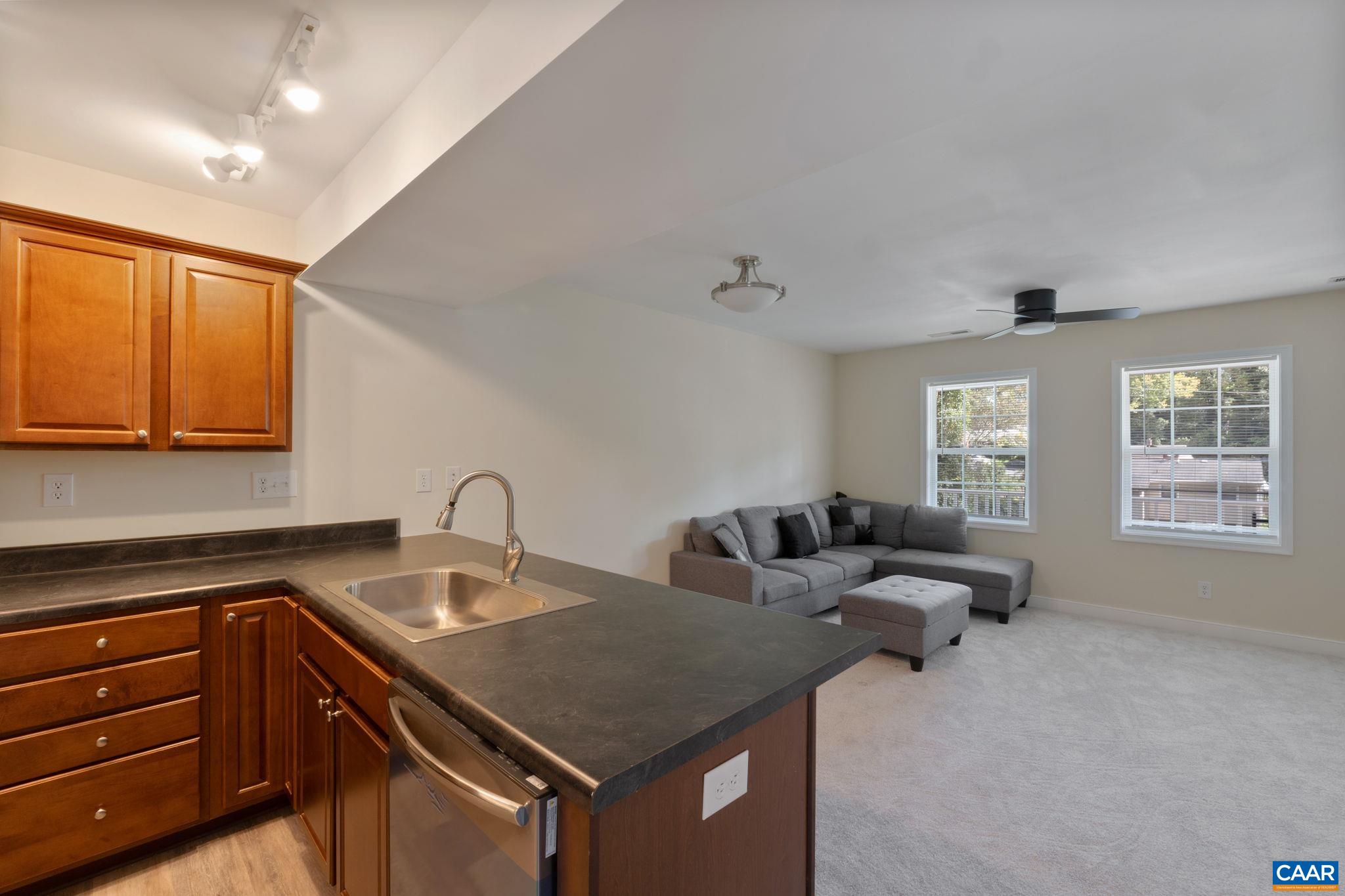 413 Valley Rd Extension Charlottesville, VA 22903 - Photo 5 of 18 a kitchen with a sink and cabinets