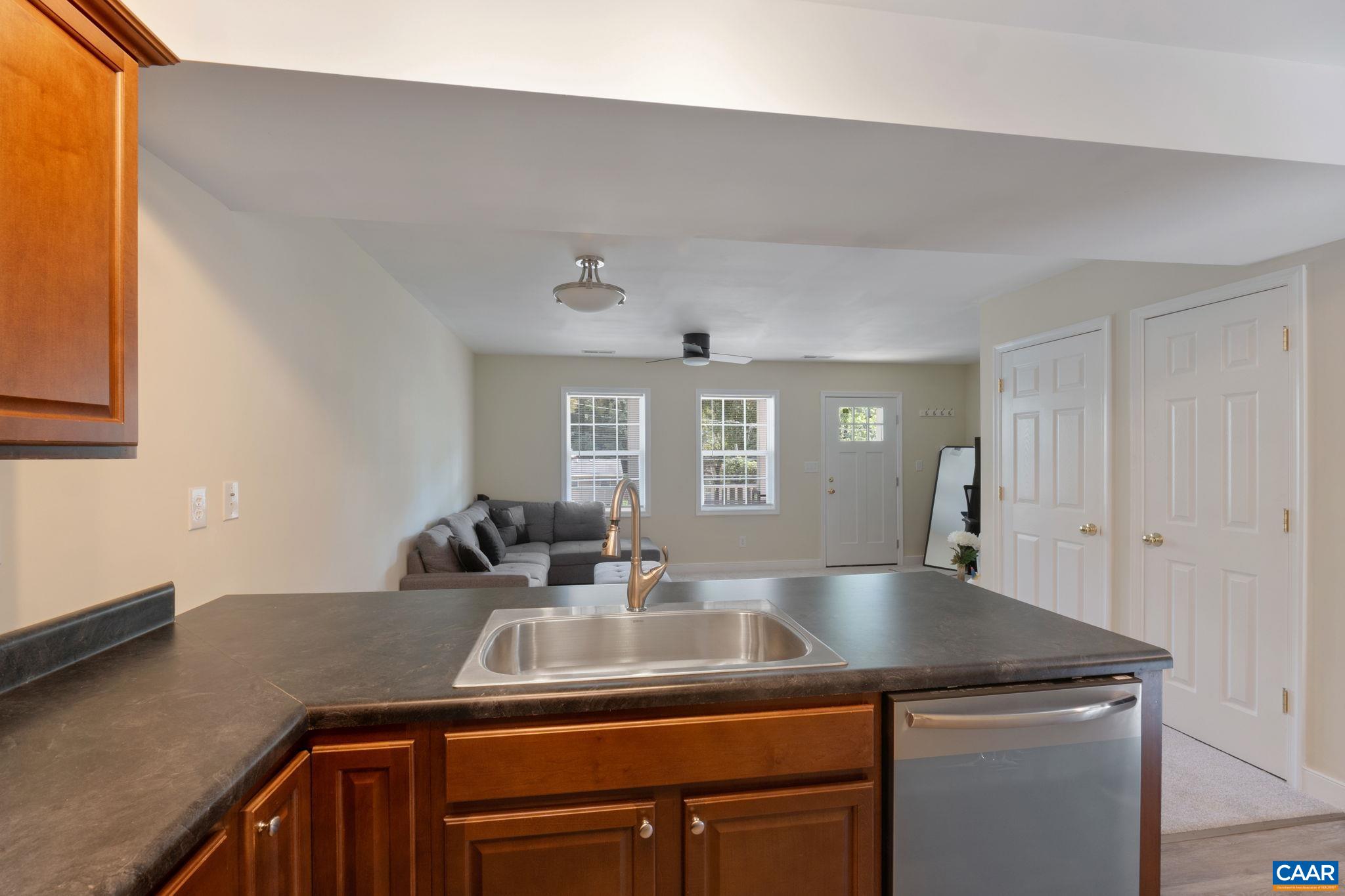 413 Valley Rd Extension Charlottesville, VA 22903 - Photo 6 of 18 a kitchen with a sink a counter space and cabinets
