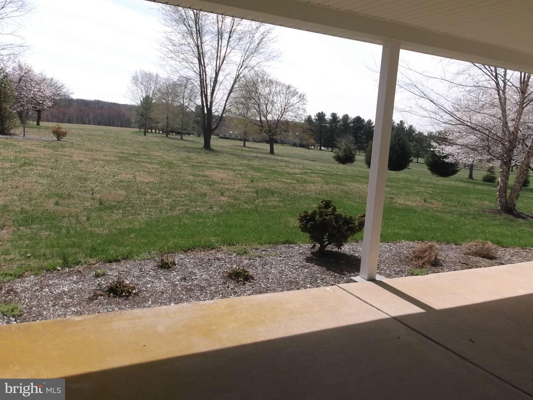 3317 Mt Carmel Road Upperco, MD 21155 - Photo 12 of 21 a backyard of a house with lots of green space